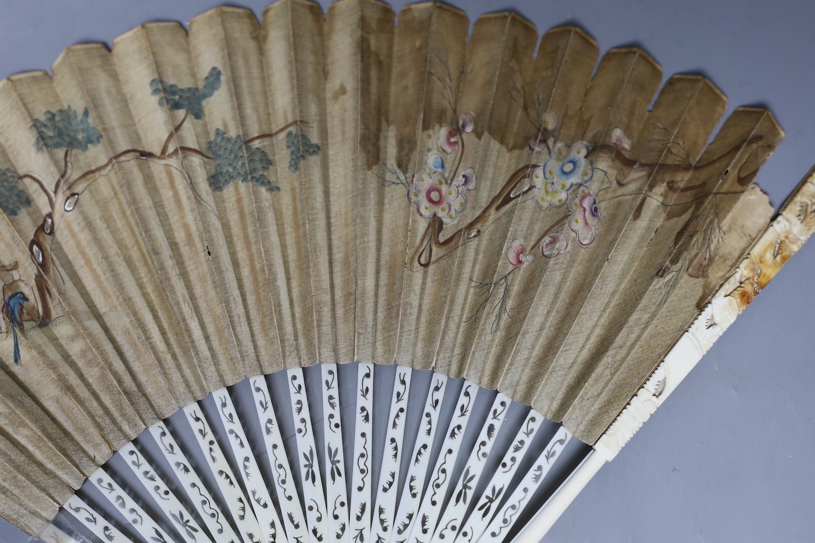 A mix collection of antique ivory to include needle cases, silver mounted gloves stretcher, etc and nut sewing accessories